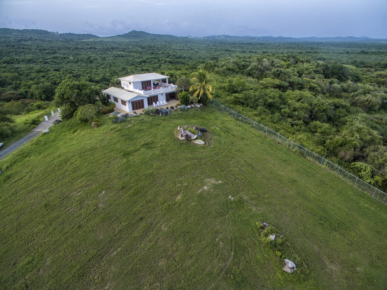 Aerial view of the Rock House on its hilltop at El Cerro Estate