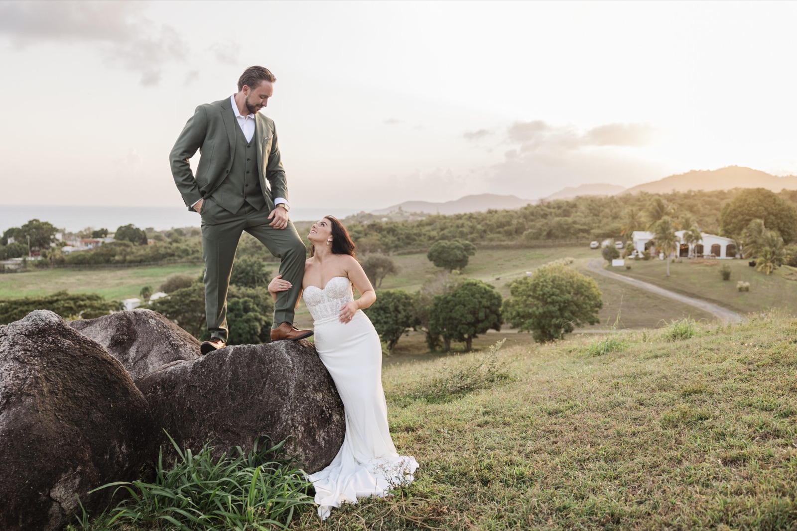 Couple at golden hour on the boulders at El Cerro Estate